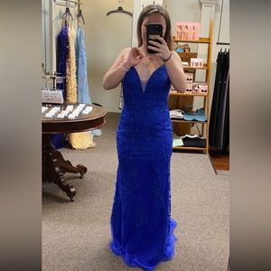 Prom dress worn once, faviana, retails over 600$, royal blue!